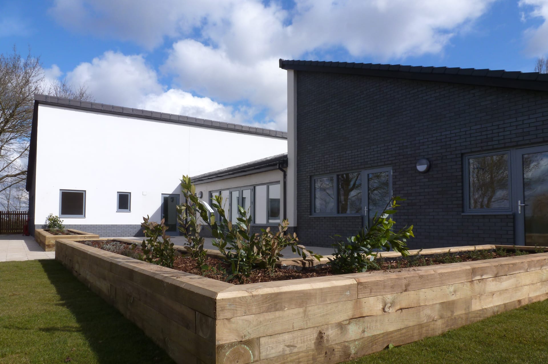 Westminster House render blue brick design